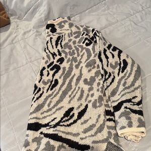 Elegant Black and Gray Animal Print Turtleneck Sweater